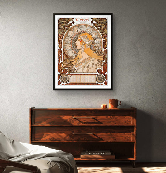 Framed art print on a wall above a wooden cabinet.