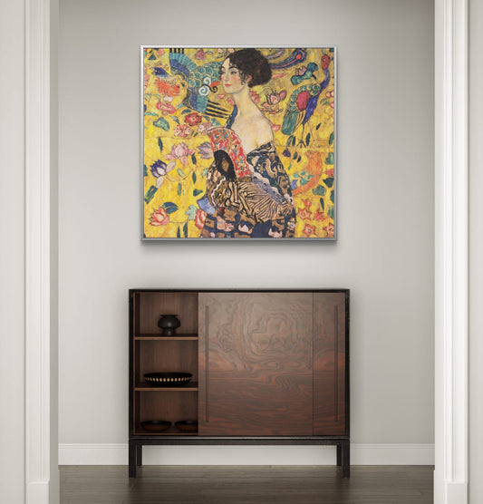 Colorful abstract painting above a wooden cabinet