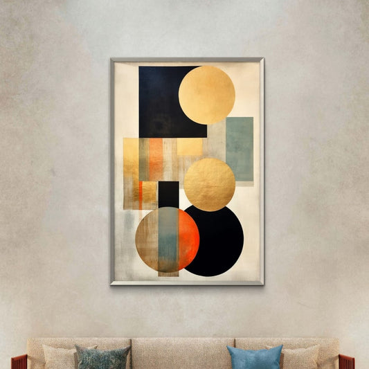 An abstract artwork featuring geometric shapes in golden and silver circles on a dark background, displayed above a sofa with a minimalist living room setup.