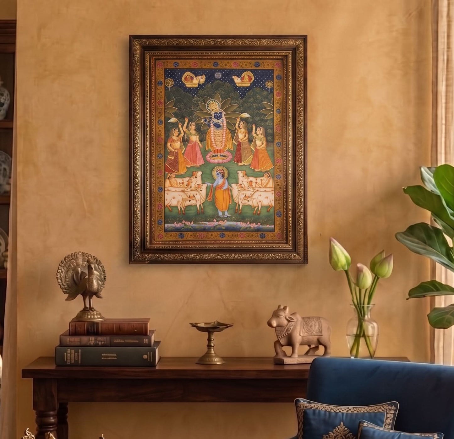 Decorative wall art with religious theme on a beige wall, with a table and decorative items below.