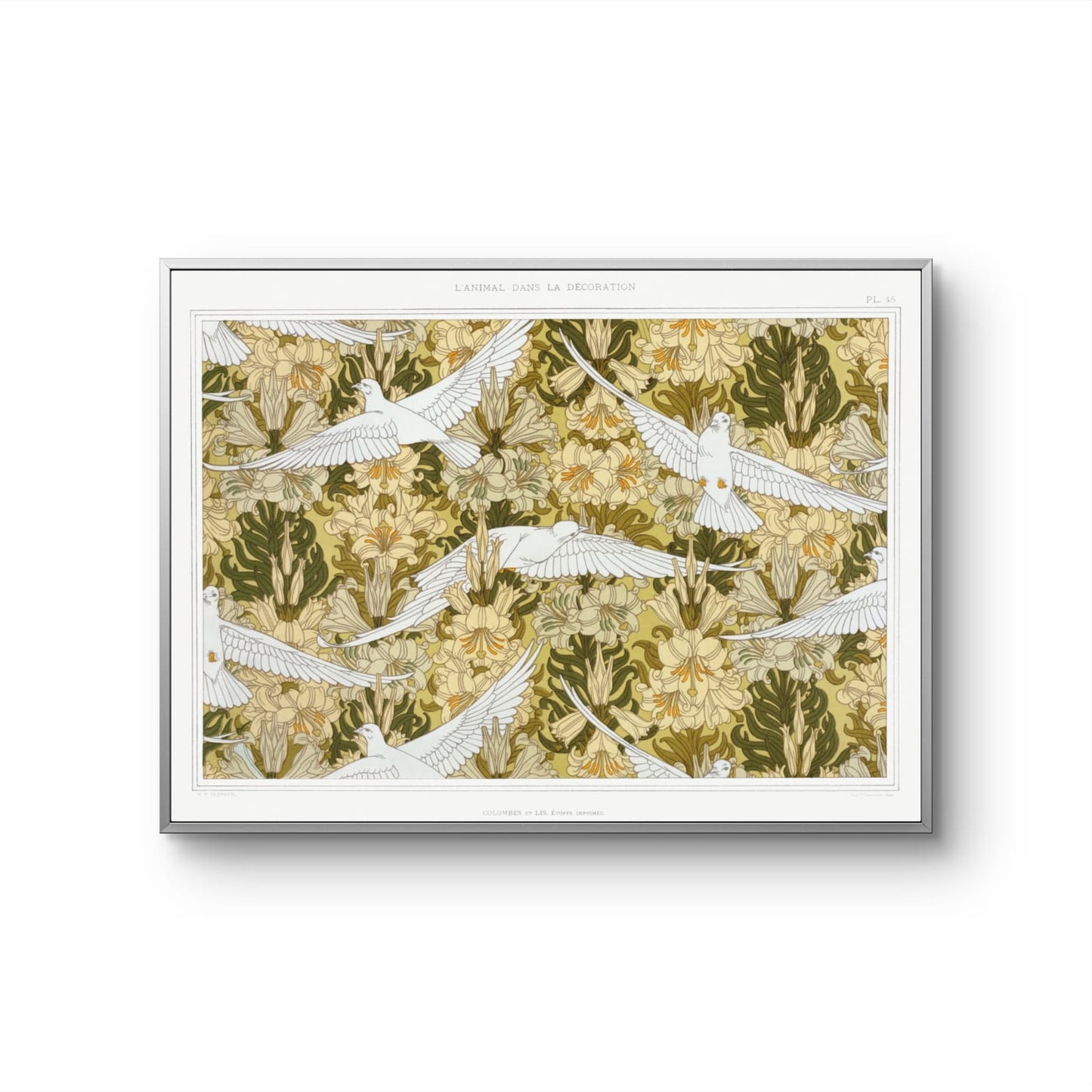 Framed artwork with white birds and green foliage on a beige background