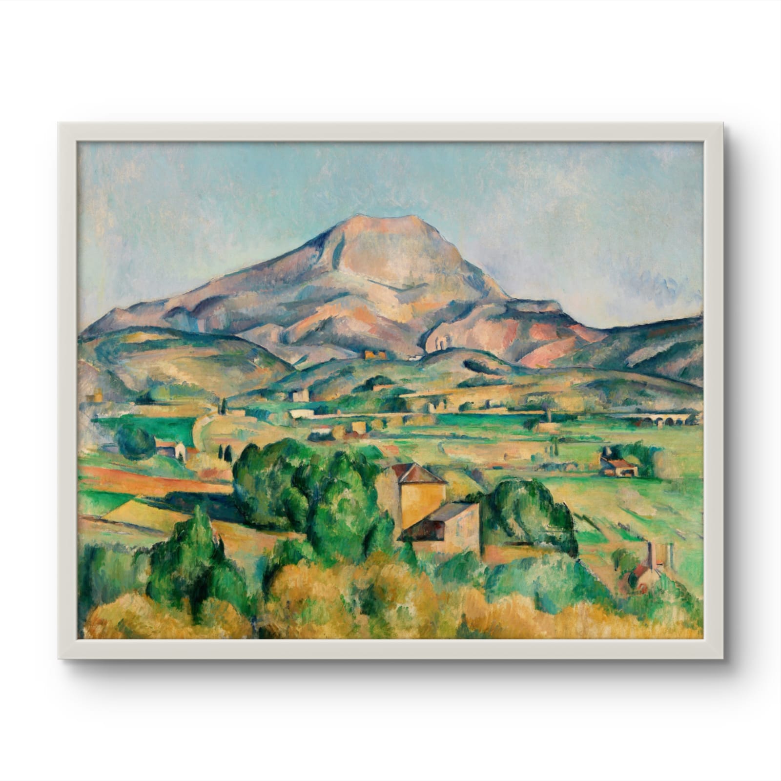 Framed painting of a mountain landscape with green fields and houses.
