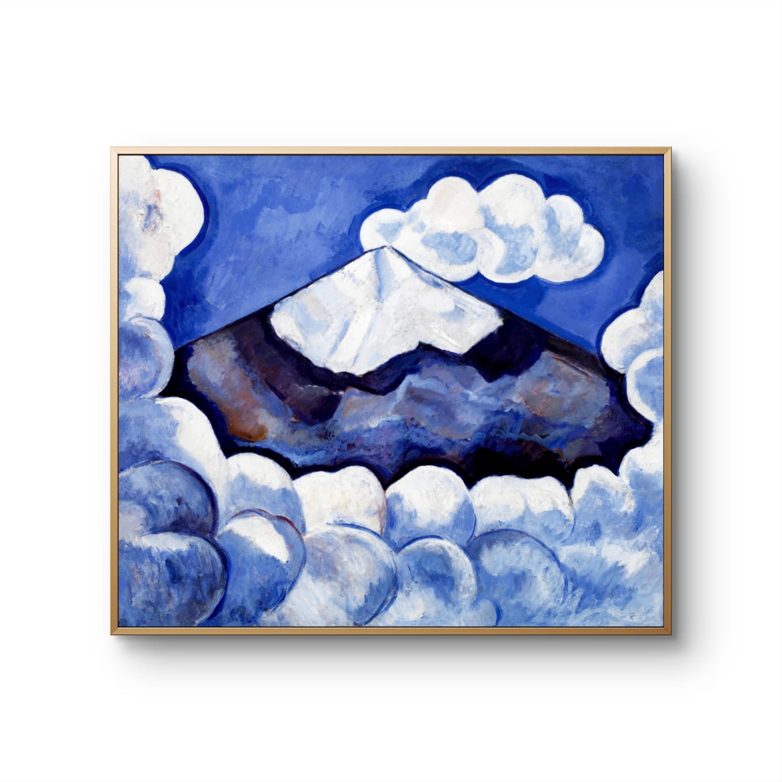 Framed artwork of a mountain landscape with blue and white tones.