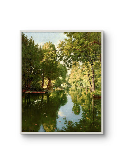 Framed artwork of a serene landscape with trees and a body of water.