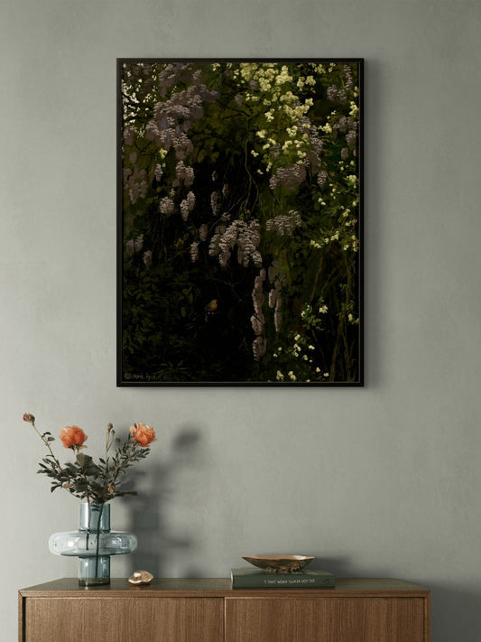 Framed botanical artwork on a wall above a wooden sideboard with decorative items.