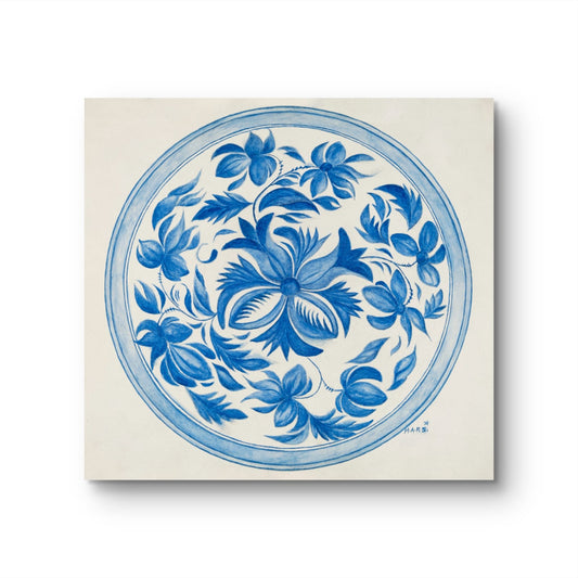Decorative plate with blue floral pattern on a beige background